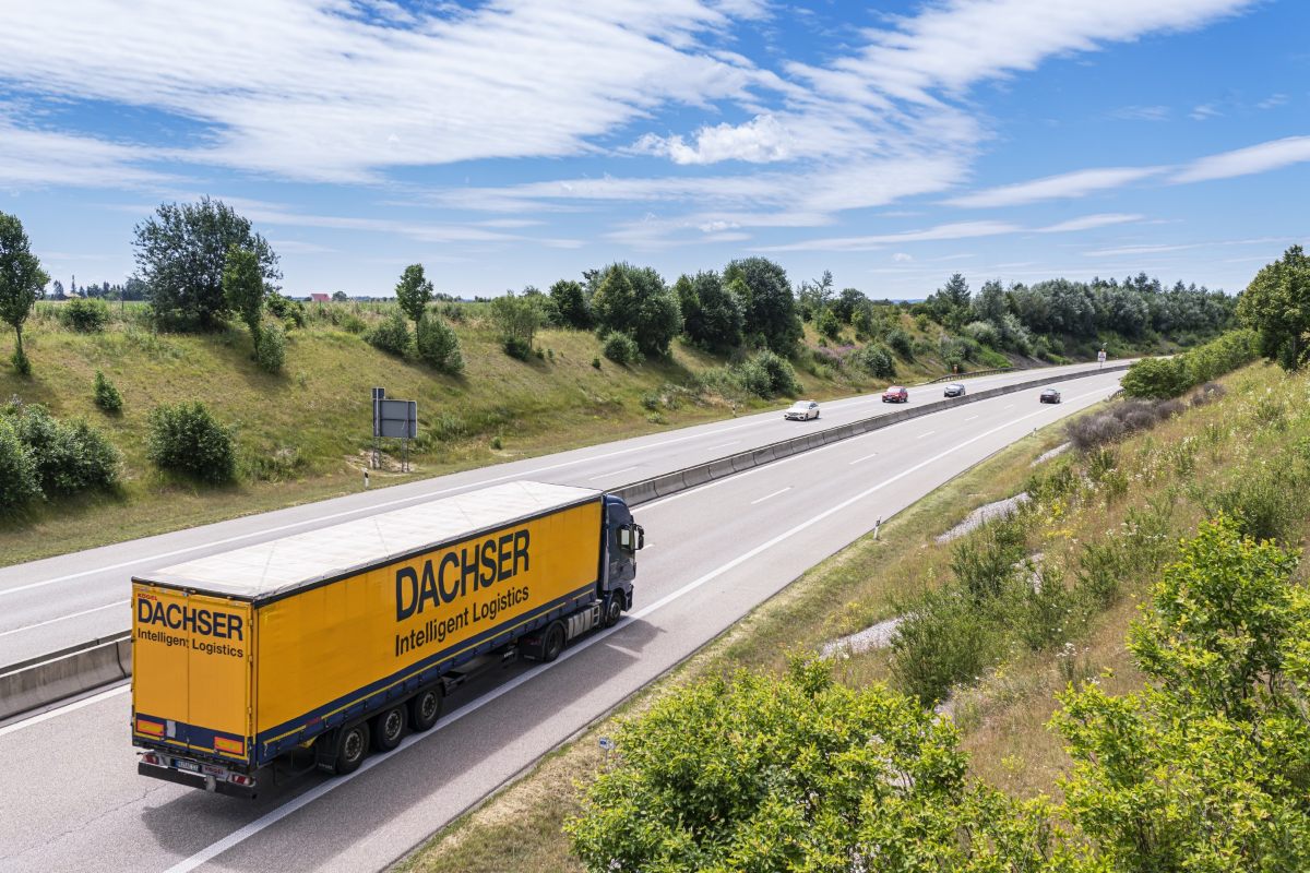 A dachser truck on the road.