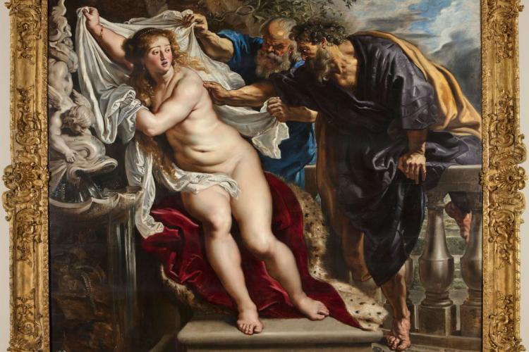 Susana y los viejos, una pintura barroca de Rubens. Representa una escena bíblica dramática en la que una mujer desnuda, Susana, intenta cubrirse con un paño blanco mientras es acosada por dos hombres mayores.